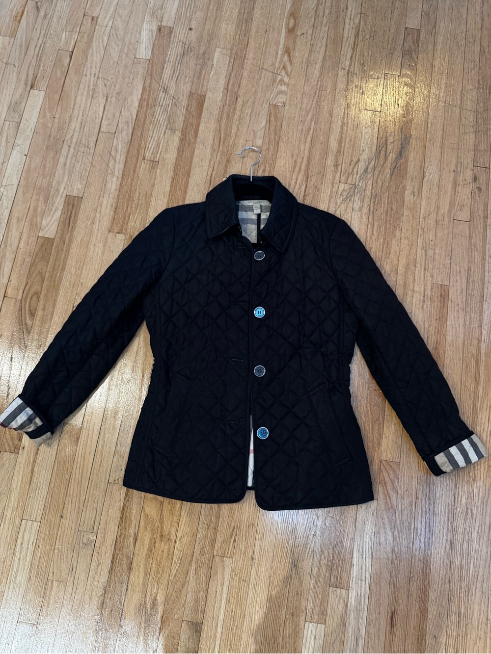 Black quilted Burberry jacket